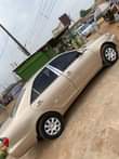 A picture of Super clean Toks standard white 2006 model with android and