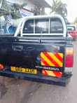 A picture of Nissan pickup on quick sale