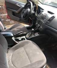 A picture of Nigerian Used Red Kia Cerato 2012 Repainted Automatic Fabric interior