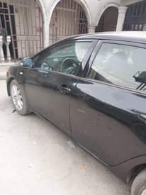 A picture of Distress sale Black Toyota Corolla fingers 3 350m location irebe