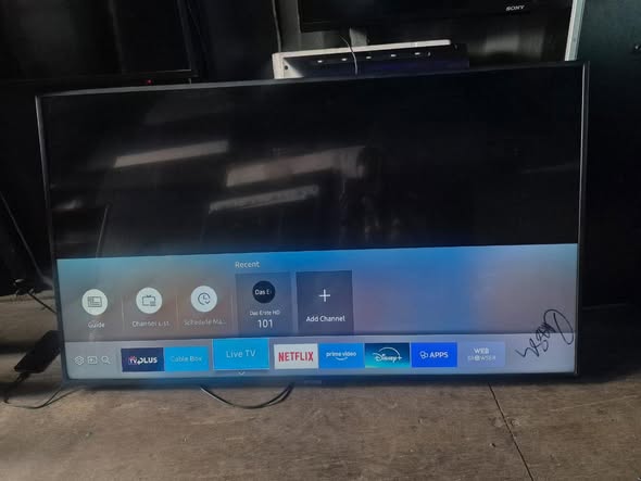 A picture of 55 INCHES SAMSUNG SMART 4K UHD TV WITH A TINY