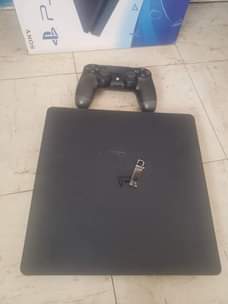 A picture of Hacked slim Playstation 4 1 terabyte with 15 games