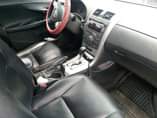 A picture of Money urgently needed for this 2010 Toyota Corolla painted on