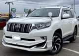 A picture of Land cruiser prado TX. 2019. Diesel available at 310M slightly