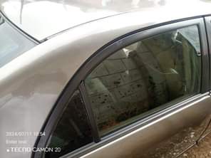 A picture of Toyota Corolla 2005 engine has tapping sound gear and ac
