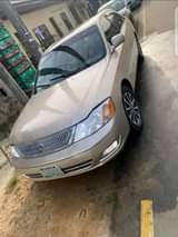 A picture of Toyota Avalon dashboard 04 model Engine AC Gear Body 1