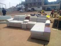 A picture of L shape sofa with cushions and high density mattress