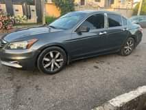 A picture of 2009 honda accord Engine Ac Gear Location is ojodu berger