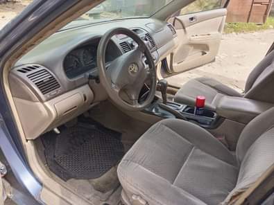 A picture of NEATLY USED 2004 MODEL TOYOTA CAMRY BIG DADDY Absolutely nothing