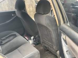 A picture of 2004 Corolla for 2 250 litt dent on the bumber