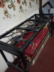 A picture of 3 ways commercial gas burners. WhatsApp 0755203312 if interested.