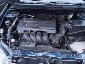 A picture of Toyota Corolla with sound engine and gear location is uyo