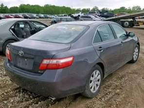 A picture of Nigeria custom services auctioning Cars bags of rice and vegetable