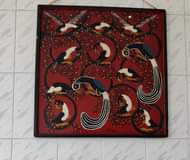 A picture of Tinga tinga painting on wood