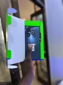A picture of Infinix smart 8 64gb 4gb ram brand new with a