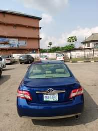 A picture of TOYOTA CAMRY LE 2011 MODEL FIRST USER AND BARELY DRIVEN