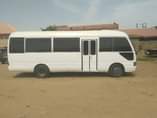 A picture of Clean used Coaster Bus 2007 model 7.7m net price Neatly
