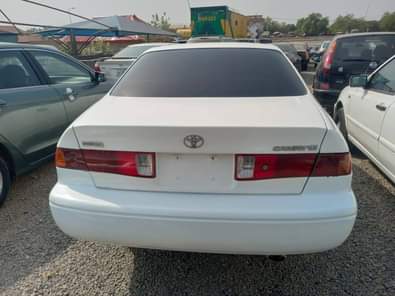 A picture of WHITE A Neatly Used Toyota Camry pencil 2002 Model With
