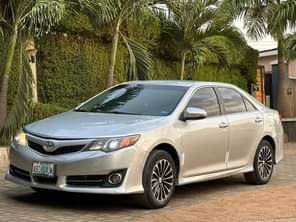 A picture of Mint 2014 Camry sport with untampered engine and follow come