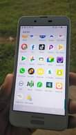 A picture of HP elite laptp pluz Aqous phone sle