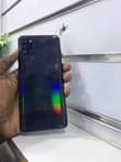 A picture of Samsung A21s 64gb 4gb ram very clean no cracks 380000