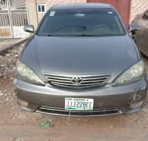 A picture of Toyota Camry 04 driving smooth Buy and paint bumper only