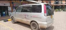 A picture of Quick sale 12M UGX Call whatsp 256704412030 Family car Noah