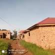 A picture of Quick sale 2plots located at matugga kavule mwelerwe town Good