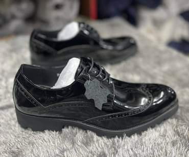 A picture of Shoes and suits