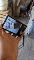 A picture of Min camera na mashine ya kubania mifuko