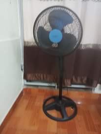 A picture of 2 standing fans box pack at 85k each 0700711388