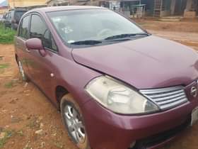 A picture of Clean Nigerian Used Nissan Tiida Repainted Fabric interior Sound four