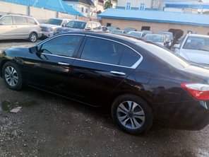 A picture of Clean toks 014 Honda accord key 4 plug engine leather