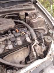 A picture of Honda civic 2003 model up for grab Engine is working