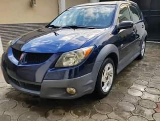 A picture of 2004 model PONTIAC VIBE for urgent sales Extremely Clean Black