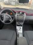 A picture of Corolla 2009 buy and drive nothing to fix Big engine