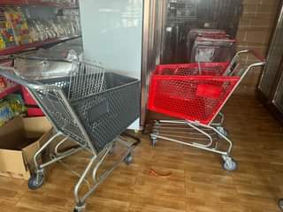 A picture of supermarket shelves for storage and trolly on sale 380k 0776182539