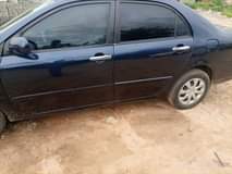 A picture of Neatly used Corolla 2006 model with untempered engine and gear