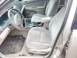 A picture of DISTRSS SALE 2004 model toyota camry LE BIG DADDY painted