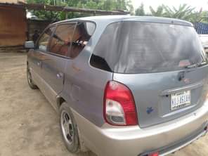 A picture of KIA carens 2008 model First body Gear Engine AC needs