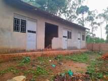 A picture of 4 single rooms for sale at 14m.Nansana