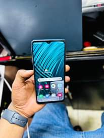 A picture of Samsung A12 128Gb 4Ram clean sana Lipia 220 000Tzs haina