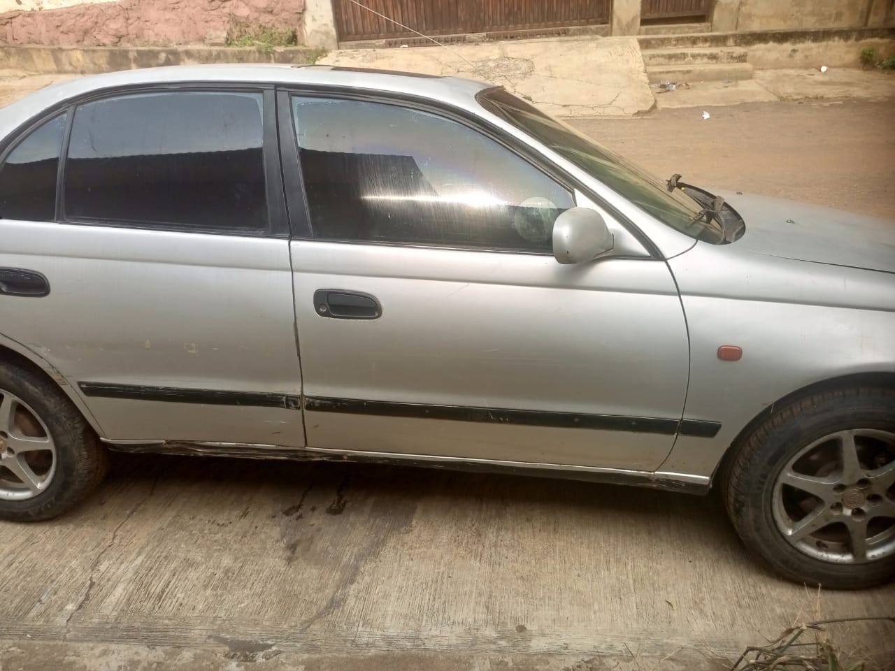 A picture of Toyota Carina E saloon manual transmission Engine Gear AC Need