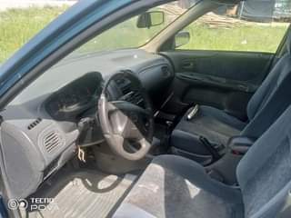 A picture of Mazda 323 NIGERIA USED