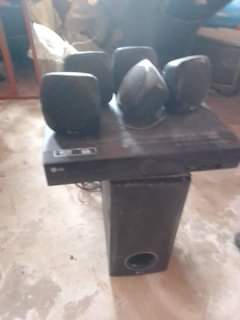 A picture of LG 21 inches TV and LG home theatre system