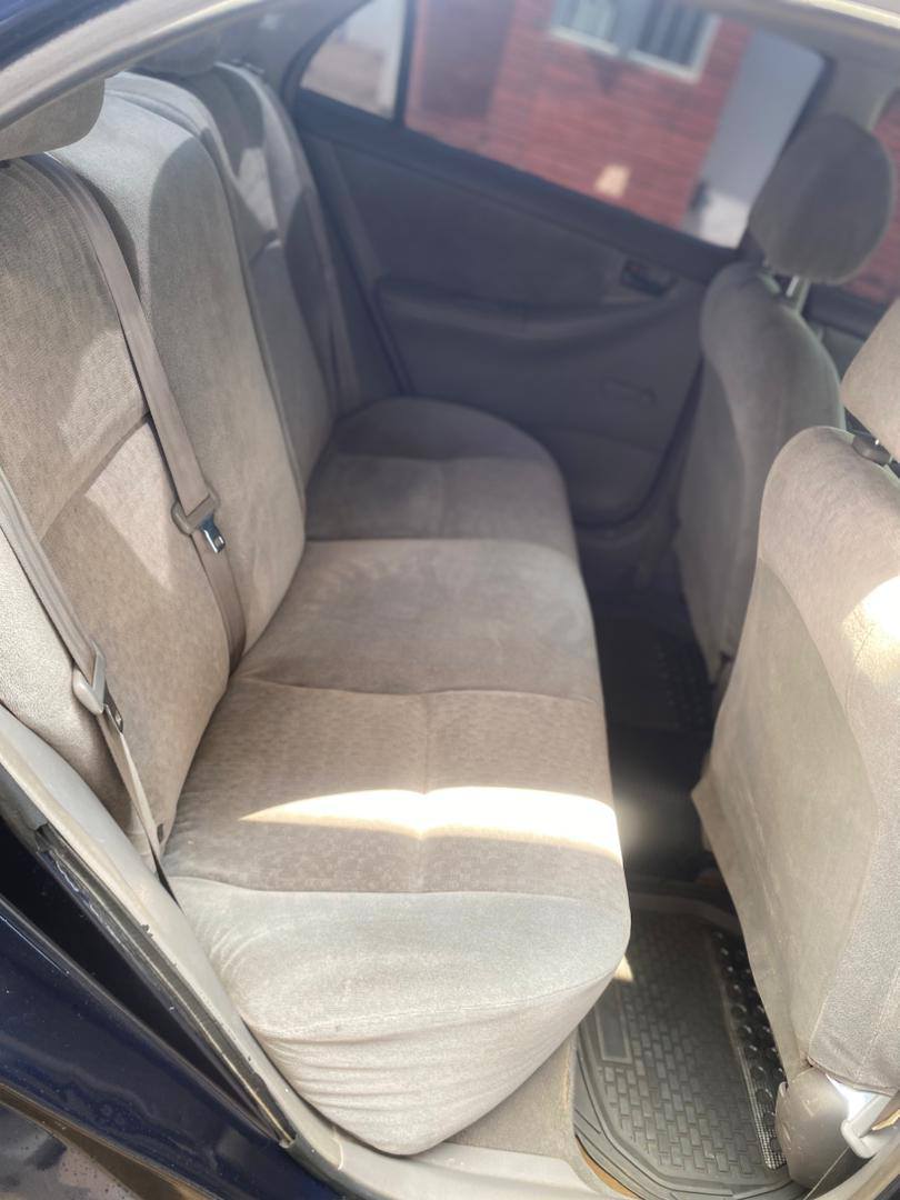 A picture of Toyota Corolla 04 with untemper engine and gearbox painted on