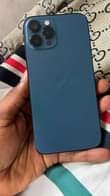 A picture of Iphone 12promax 128gb 87 battery health with carton 440k