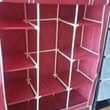 A picture of 3 column wooden closets