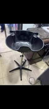 A picture of La Kuoshea Nywele Salun Elfu 65 Tu O717O337OO Shekilango