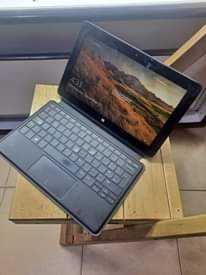 A picture of Dell with 4gb and 128gb Ssd Touch screen and Detachable